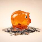 ALCANCÍA PUERQUITO NARANJA TRASLUCIDO INF 040 O (PLÁSTICO) - Image 2